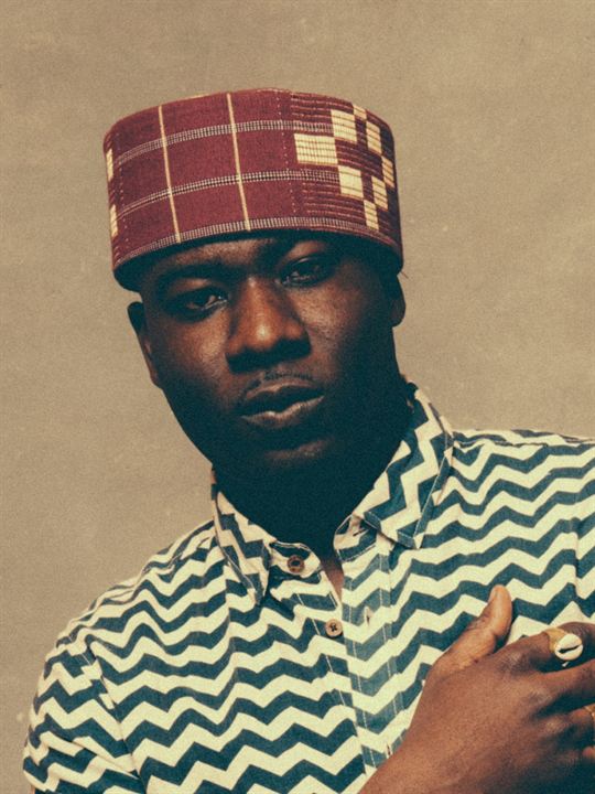 Blitz the Ambassador; Akra, Gana doğumlu Samuel Bazawule olarak da bilinen Ganalı yönetmen, yapımcı, kurgucu